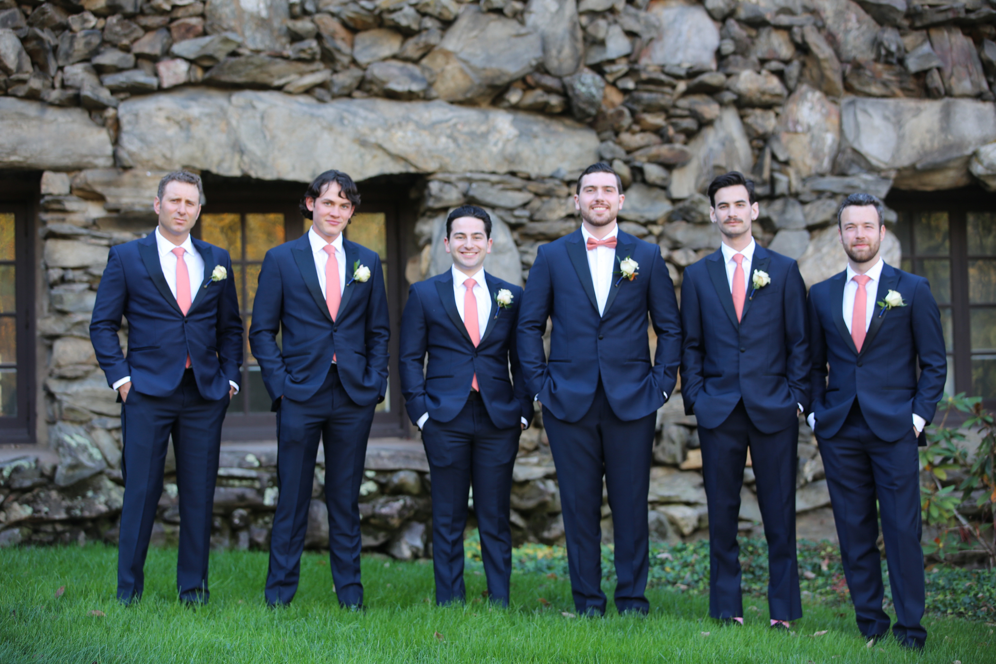 Groomsmen pose for portraits before their wedding at the Grove Park Inn in Asheville NC. 