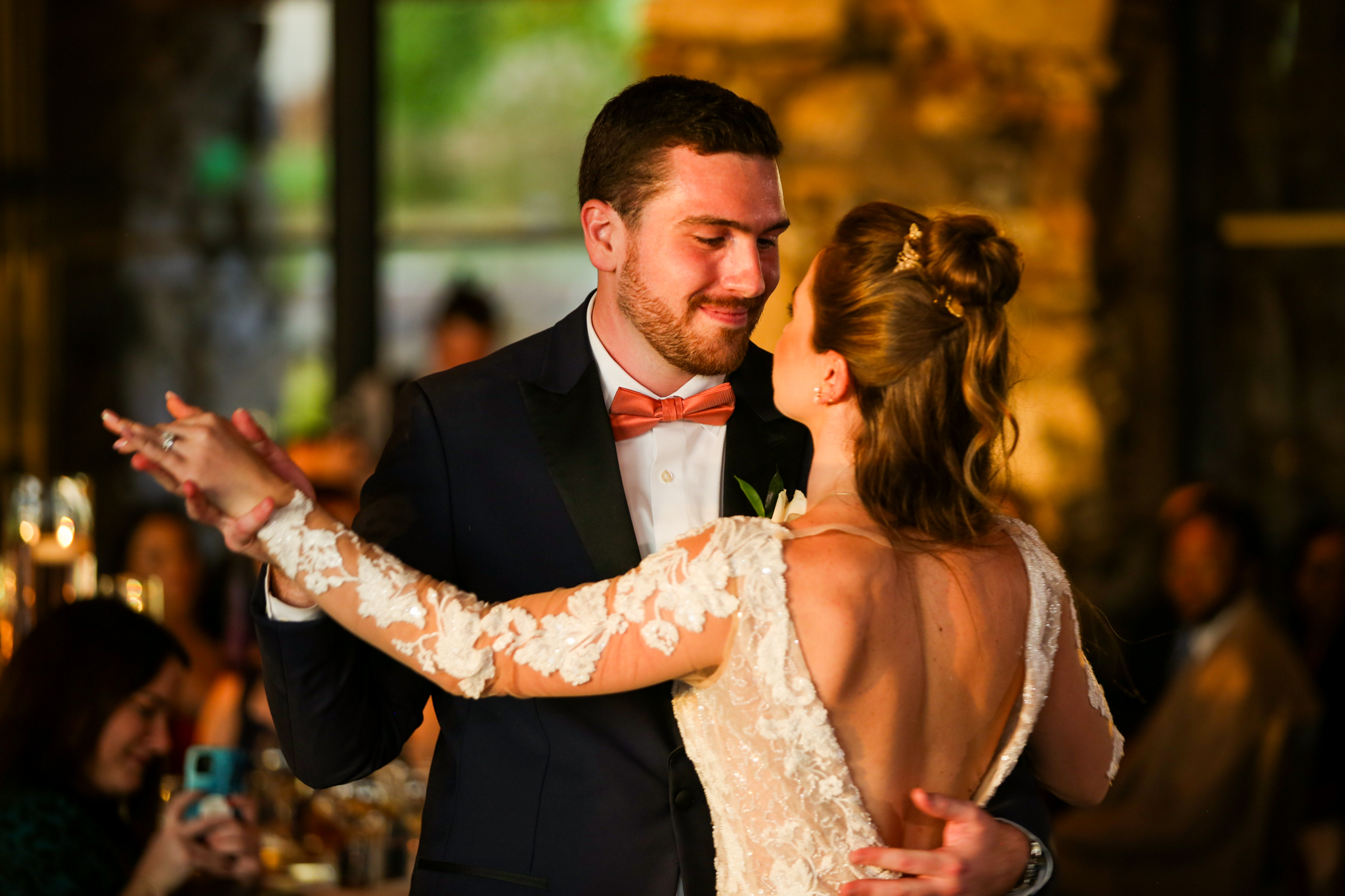 A bride and groom have their first dance at the Grove Park Inn. 