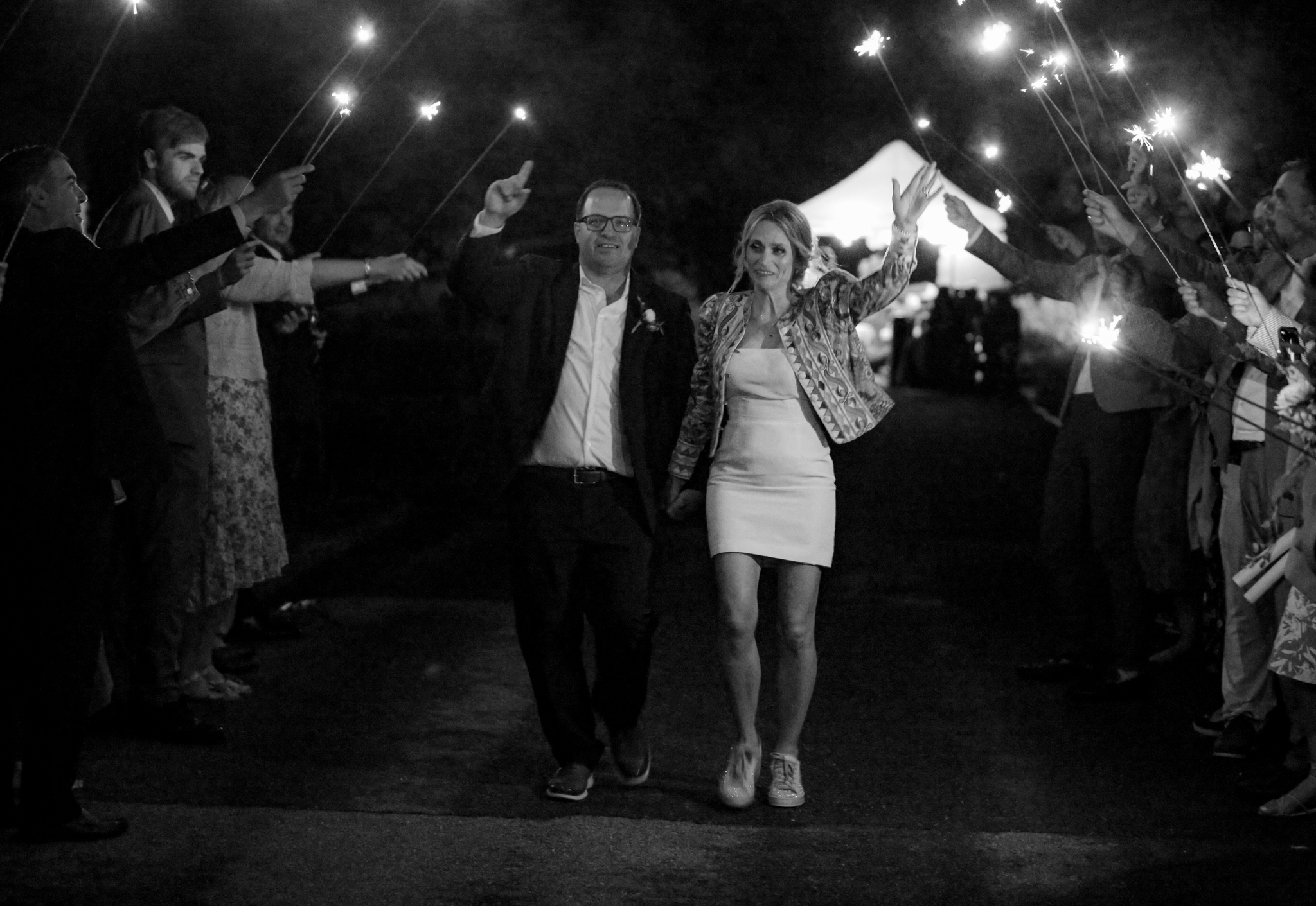 A bride and groom leave the Biltmore on a sparkler exit on their wedge day.  