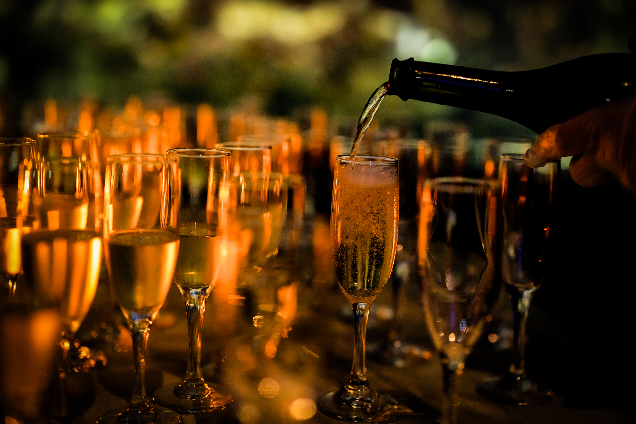 Champagne is poured at the Wilmington Wedding in North Carolina. 