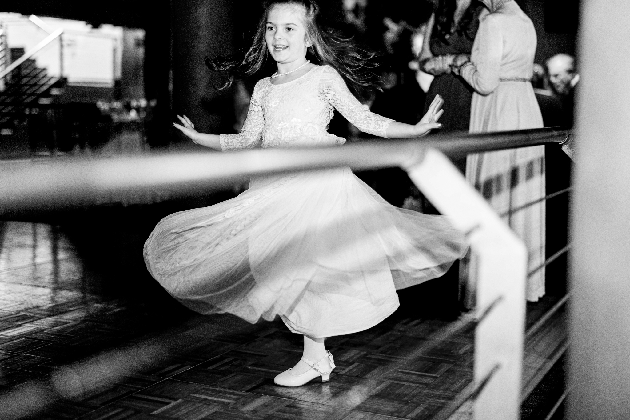The flower girl dances at a Wedding in North Carolina.