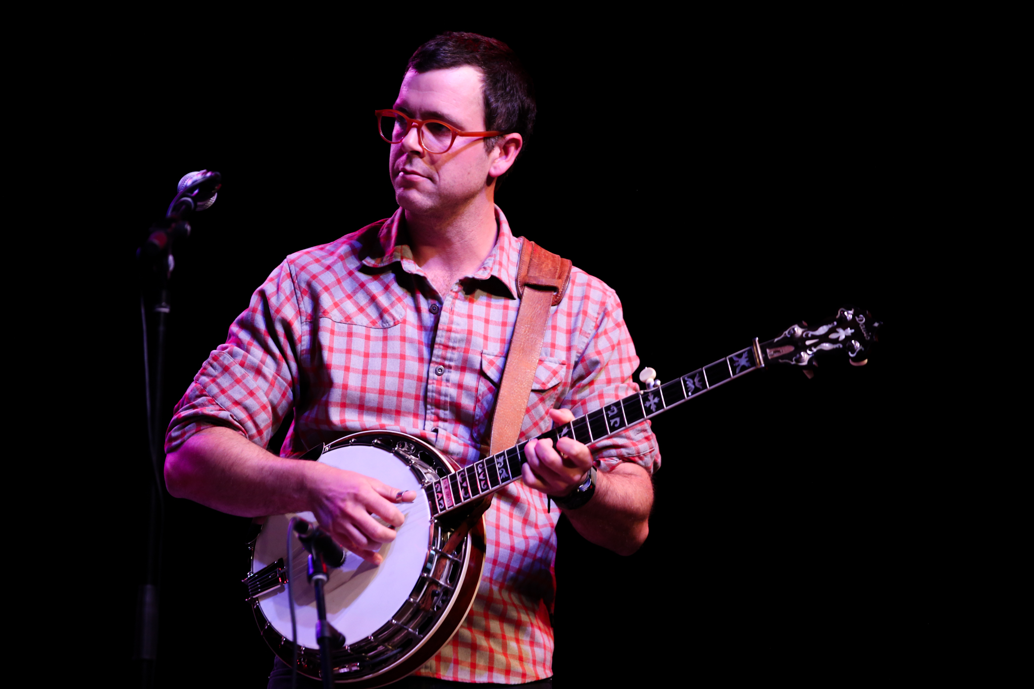 Bennett Sullivan plays banjo in North Carolina 