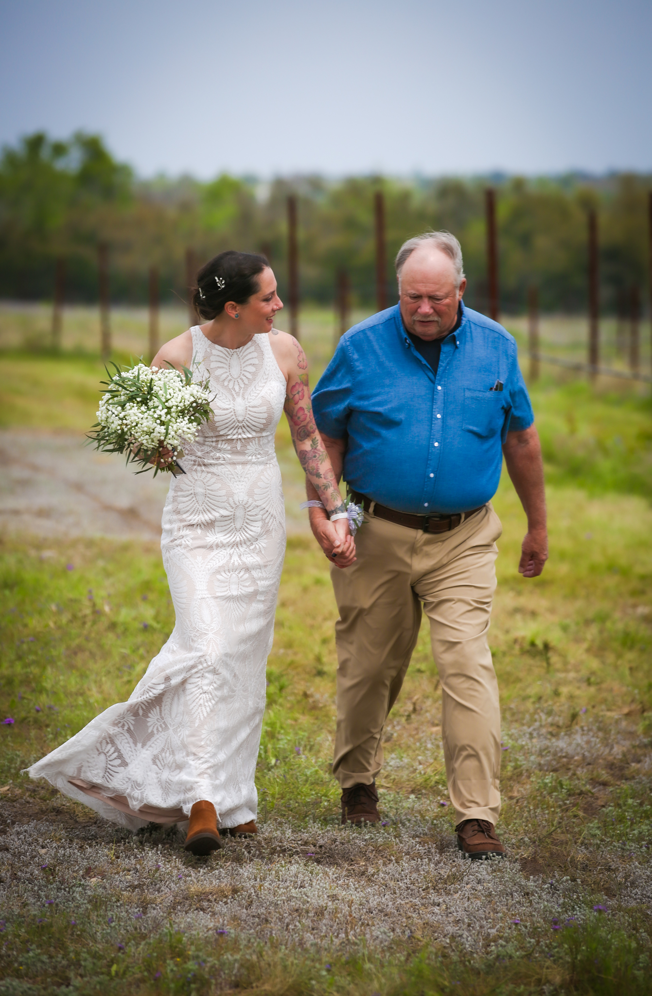 A dad walks his daughter down the aisle in rural texas for a eclipse wedding. 