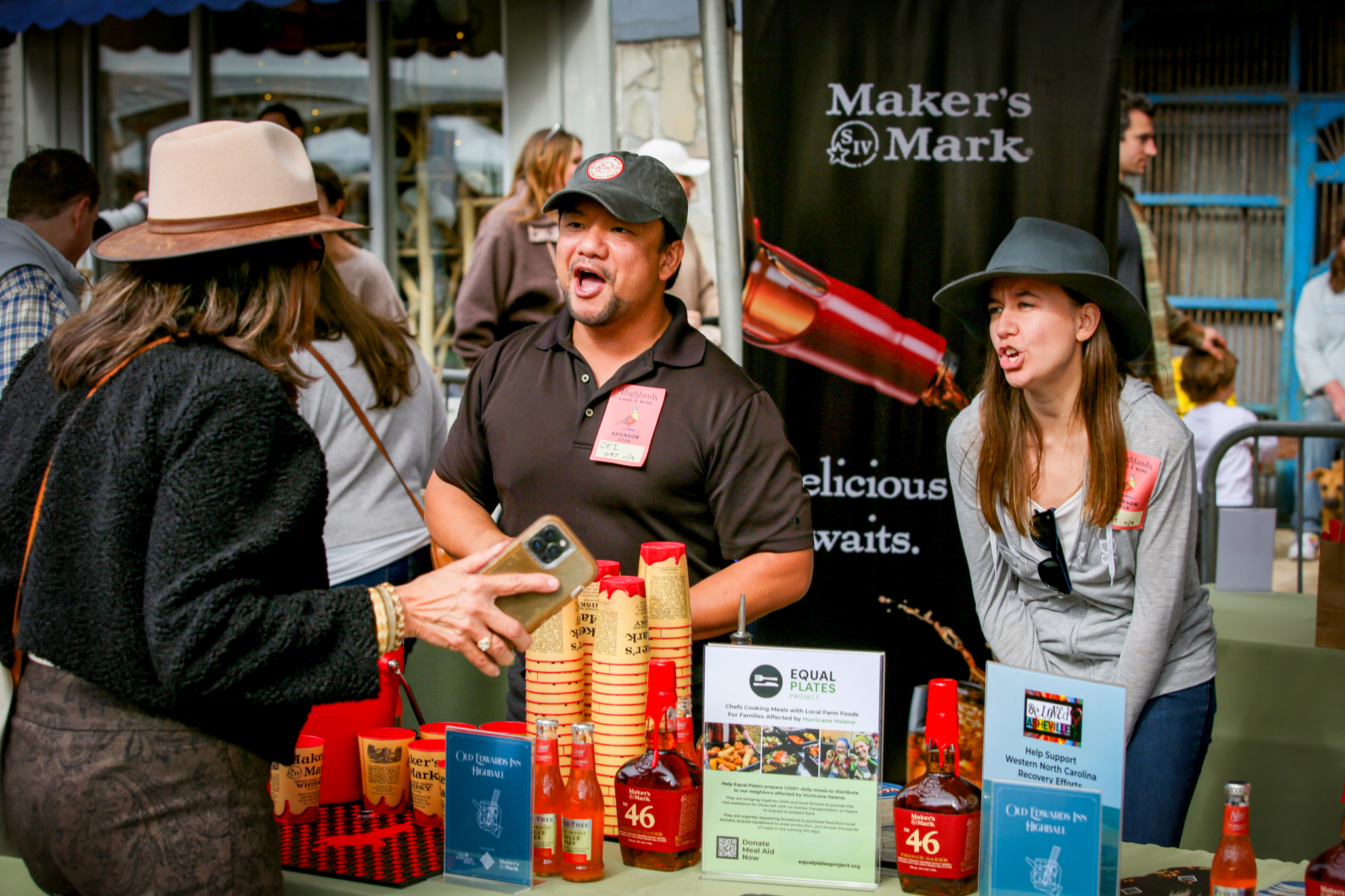 Vendors talk to attendees at the Highlands Food and Wine Festival. 